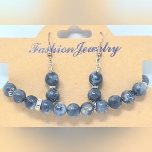 earrings and bracelet made of natural stone labradorite and accessories in silve